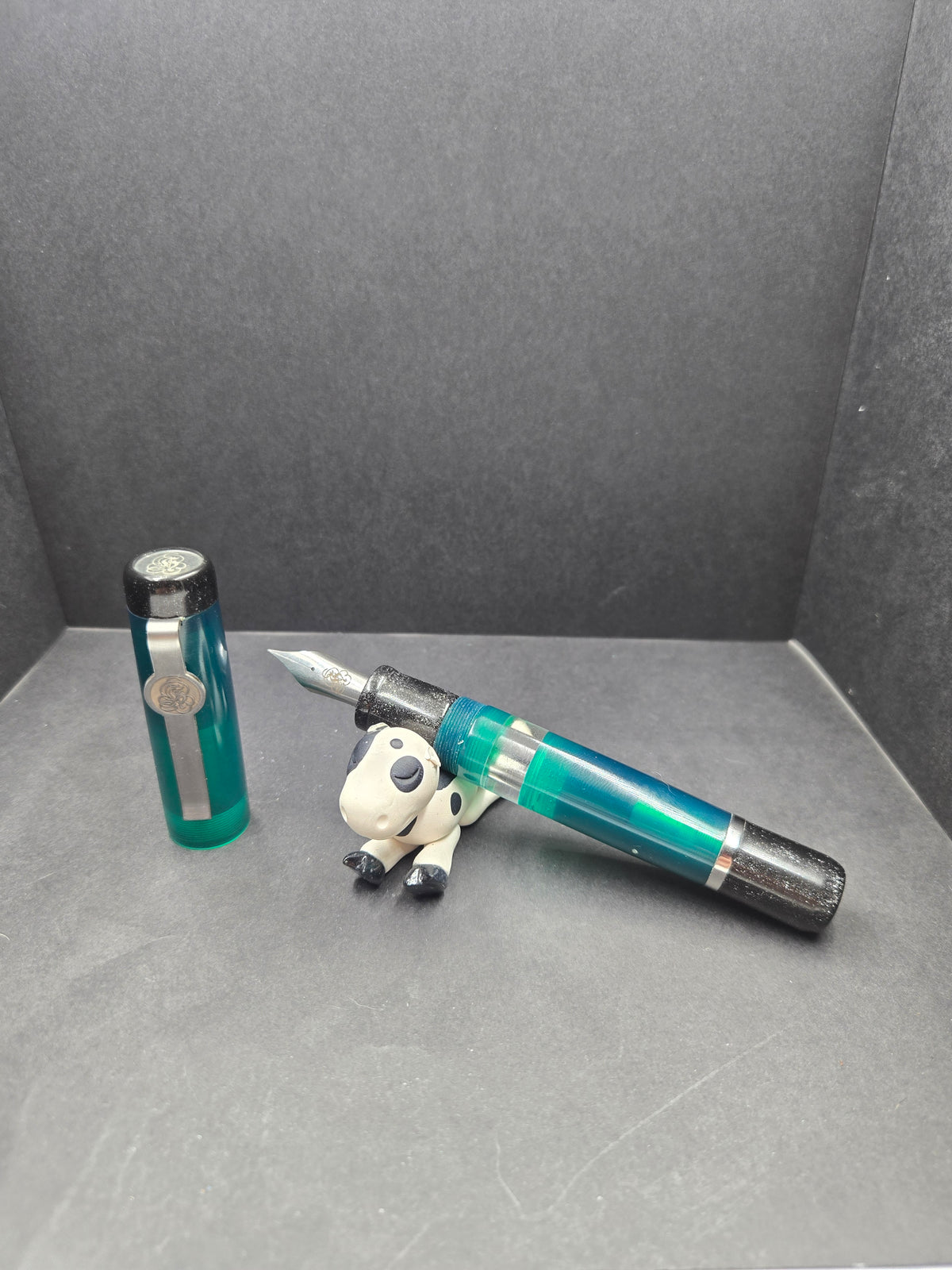 B46 - König - Translucent Forrest Green w/Black trim