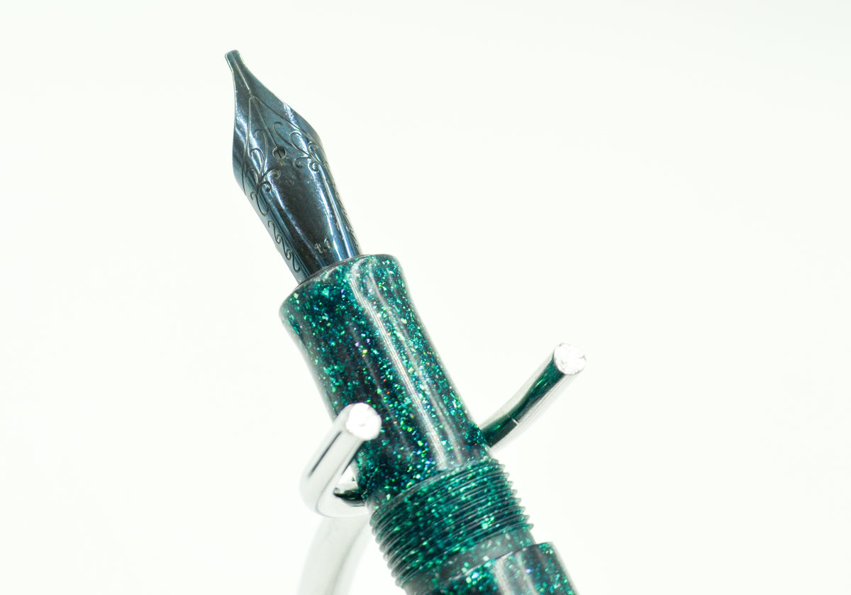 M414C - Teal Radiance Diamond Cast - Jowo 1.1 Gunmetal nib